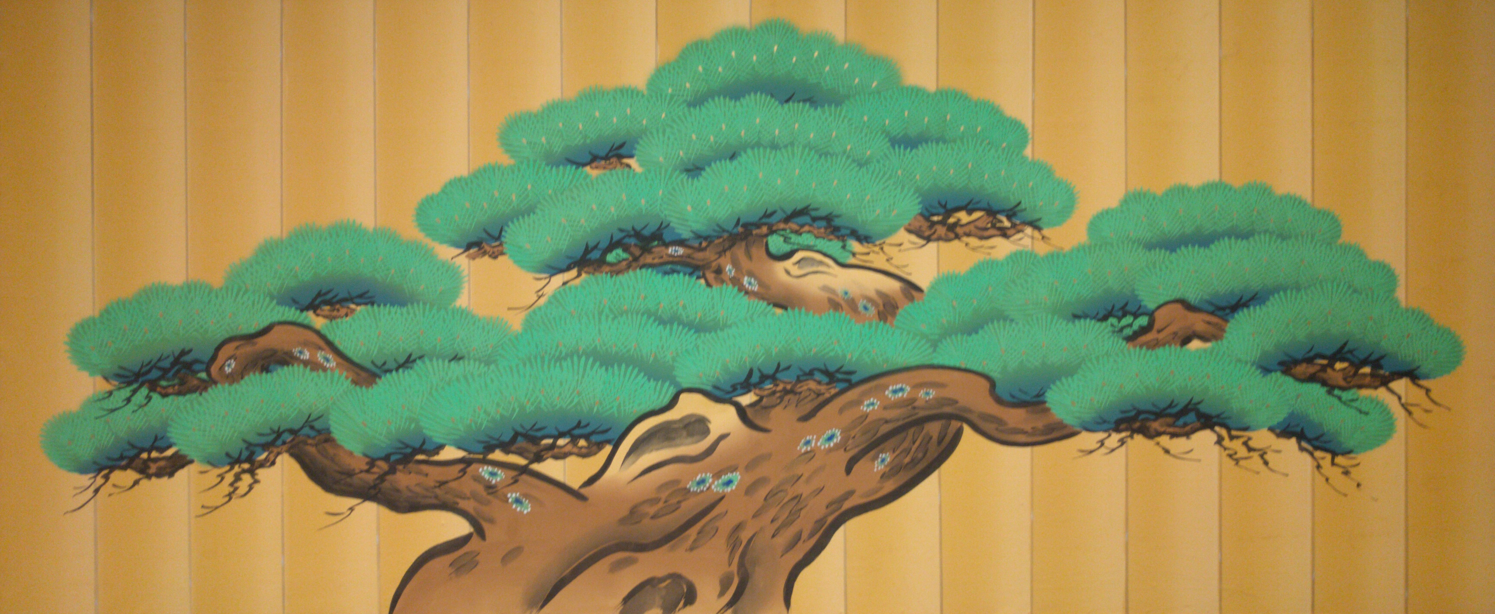 a bonsai tree painted on a garage door